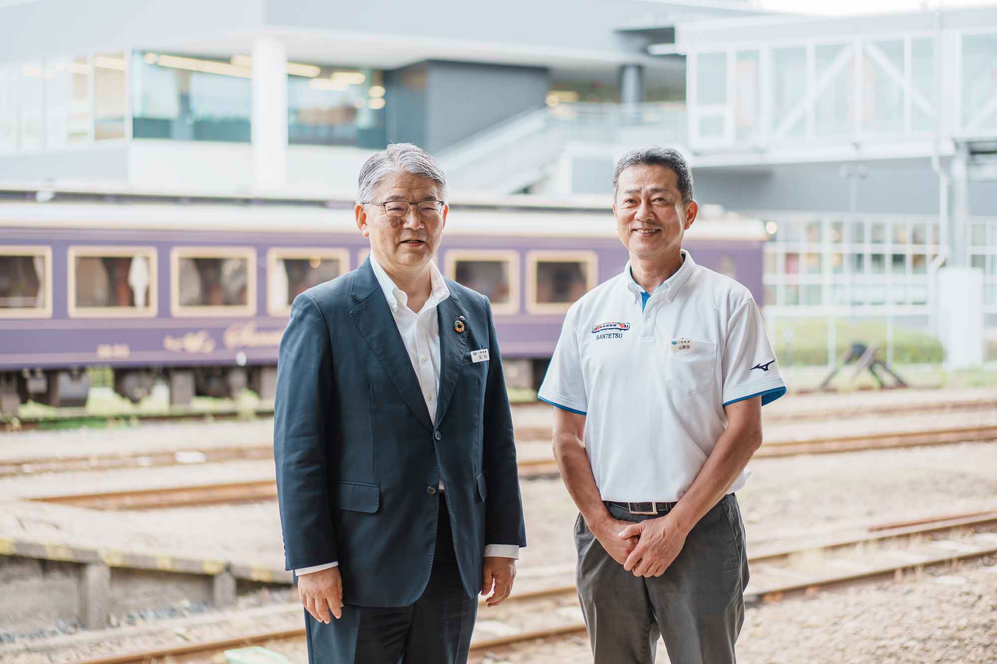 （左）代表取締役社長の石川義晃氏　（右）震災学習列車担当の山野目真氏